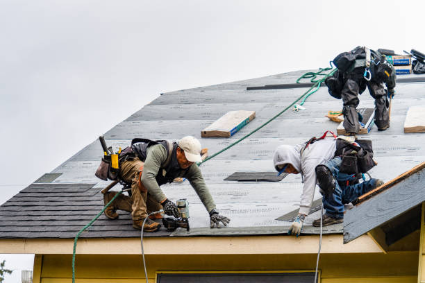 Professional Roofing technician working in Mellott, IN